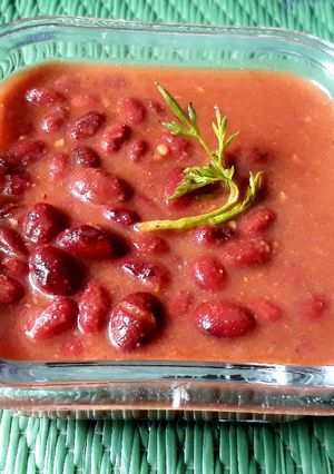 A picture of Red beans in tomato gravy.