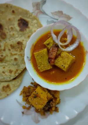 A picture of "Besan dhokli sabji with ghee Paratha and caramelized dhokli".