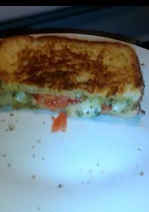 A picture of Grilled Cheese with pesto & mozzarella.