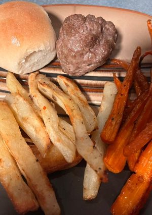 A picture of Meatloaf Balls w/roasted carrots & potatoes.
