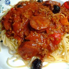 A picture of linguine in meat sauce.