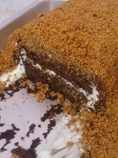 A picture of Ponny's Choco ganache cake with almond crumble.