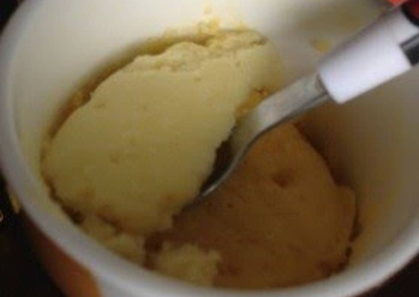Cake with egg in a cup with pancake mix