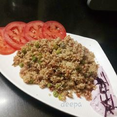 A picture of Banyard millet pulao with pink raita.