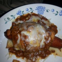 A picture of Gourmet chili cheese dogs.