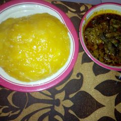 Goat meat Banga soup and starch A picture of Goat meat Banga soup and starch.