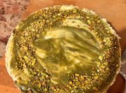 Una foto de tarta crema de pistachos