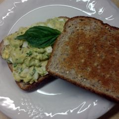 A picture of Bacon Egg and Avacado Breakfast Sandwich.