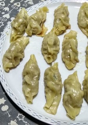 Una foto de Gyozas de carne de cerdo, gambas y pimiento verde