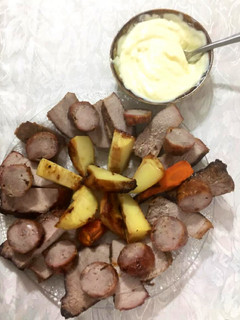 Una foto de Carne con papas