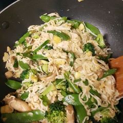 A picture of Noodles with veggies.