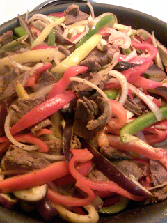 A picture of beef or chicken fajitas.