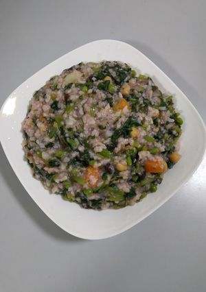 A picture of Red Amaranth Potato Rice Porridge with Chickpeas.