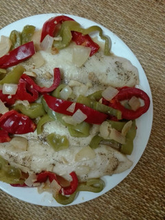 Una foto de Filetes de panga con pimientos