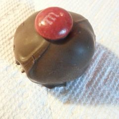 A picture of No Bake Chocolate Peanut Butter M&M Balls.