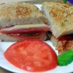 A picture of Ham and Swiss Herb Panini.