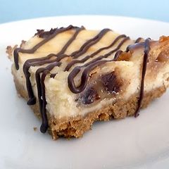 A picture of chocolate chip cookie cheesecake bars.
