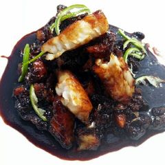 A picture of Carmelized Fish.