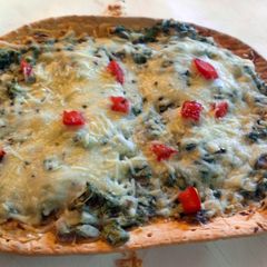 A picture of Baked Spinach florentine flatbread.