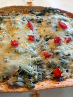 A picture of Baked Spinach florentine flatbread.