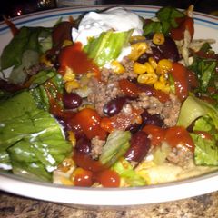 A picture of loaded taco salad.