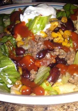 A picture of loaded taco salad.