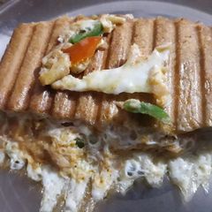 A picture of Bread omelette sandwich.