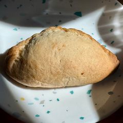 A picture of Mango Pineapple Empanada.
