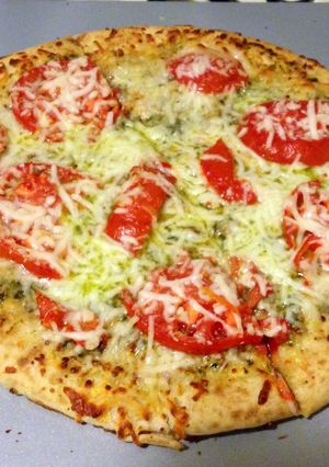 A picture of Quick & Easy Tomato Pesto And Mozzarella Pizza.