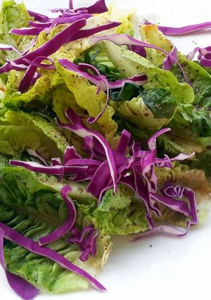 A picture of LG ROMANIA SALAD( SOY SAUCE DRESSING)( VEGAN ).