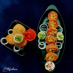 Stuffed tomato bonda A picture of Stuffed tomato bonda.