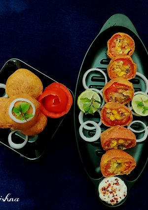 A picture of Stuffed tomato bonda.
