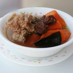 A picture of Carrot And Sour Plum In Pork Soup.