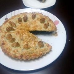 A picture of Blueberry pie with cinnamon.