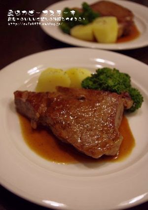 A picture of Tender Beef Steak with Red Wine Sauce.