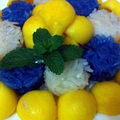 A picture of Mango or Durian with Sticky Rice.