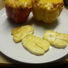 A picture of Stuffed peppers and garlic fried haloumi.