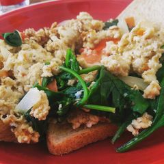 A picture of Fridge leftovers scrambled eggs.