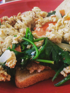 A picture of Fridge leftovers scrambled eggs.
