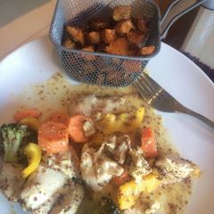 A picture of Easy mustard and honey chicken lunch with sweet potato cubes.
