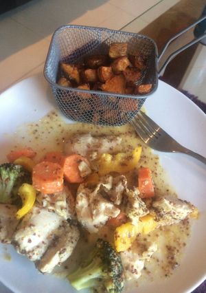 A picture of Easy mustard and honey chicken lunch with sweet potato cubes.