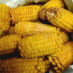 A picture of Deep fried corn on the cobb.