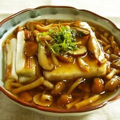 A picture of Firm Tofu with Nameko Mushroom Sauce.