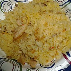 A picture of Twice cooked chicken in zesty Italian dressing with side of spicy chicken skins.