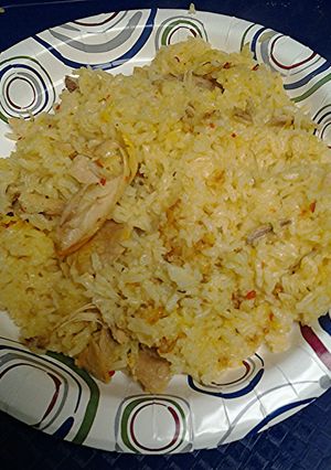 A picture of Twice cooked chicken in zesty Italian dressing with side of spicy chicken skins.