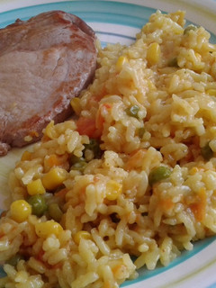 Una foto de Arroz cremoso con cùrcuma y base de pollo