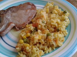 Una foto de Arroz cremoso con cùrcuma y base de pollo