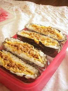 A picture of Chicken Soboro and Egg Onigiri Sandwich.