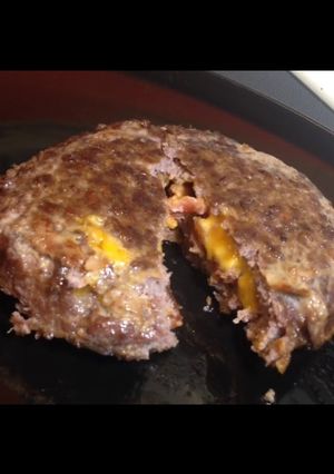 A picture of Bacon Cheese Stuffed Burger.