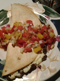 A picture of Baked meatless tacos (with fresh salsa).
